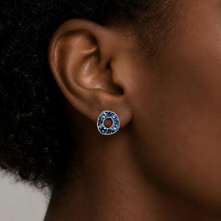 Model wearing the Azure Halo Stud Earrings