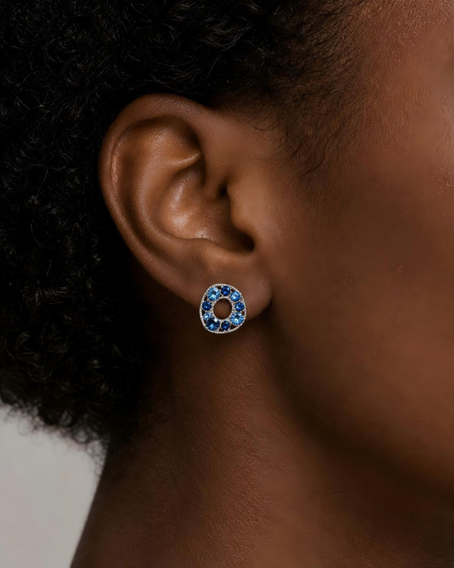 Model wearing the Azure Halo Stud Earrings