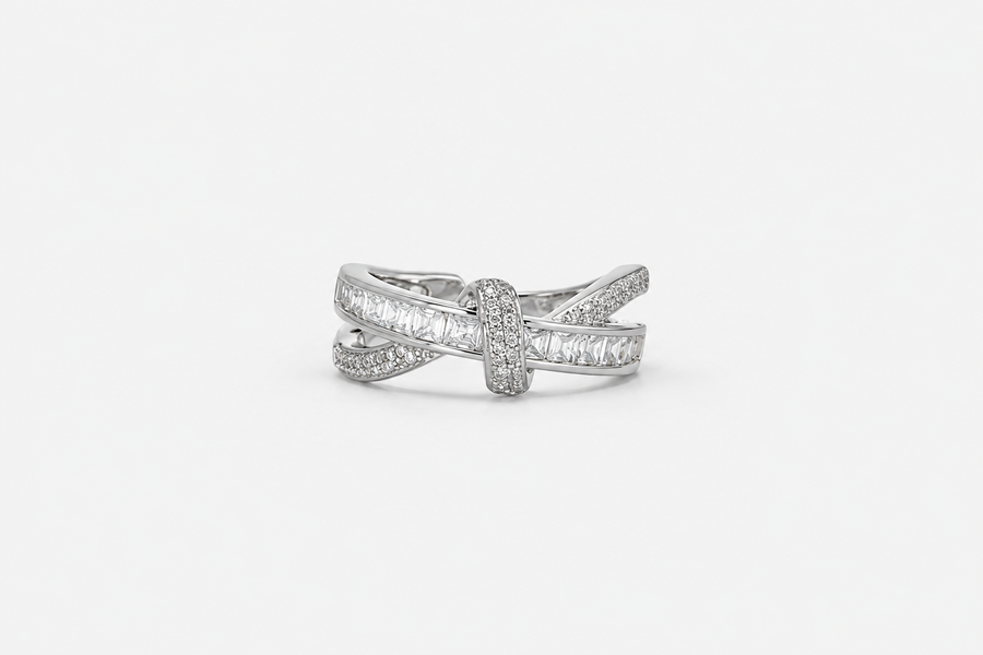 Silver Ribbon Knot Ring with baguette and pavé stone details