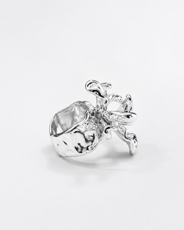 Side view of the Iris Bloom silver floral statement ring